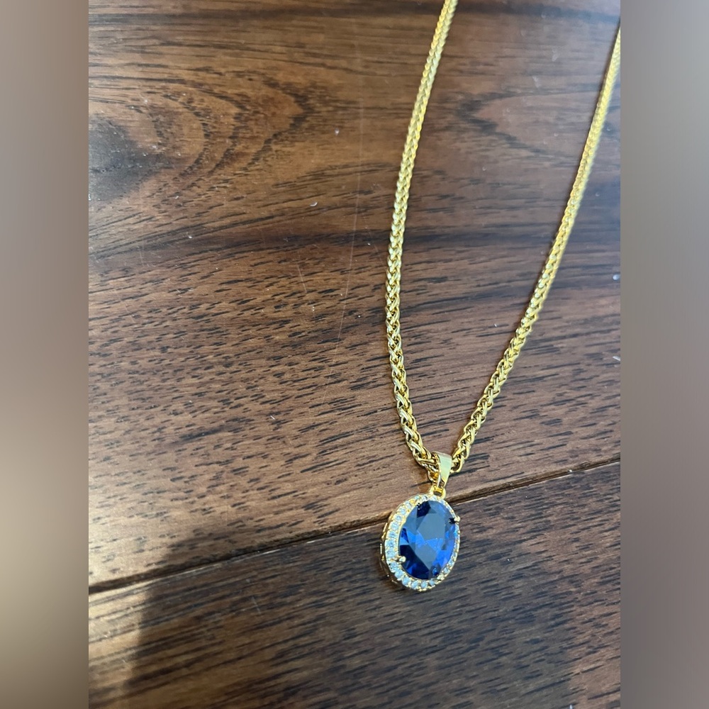 Gold necklace with bling pendant